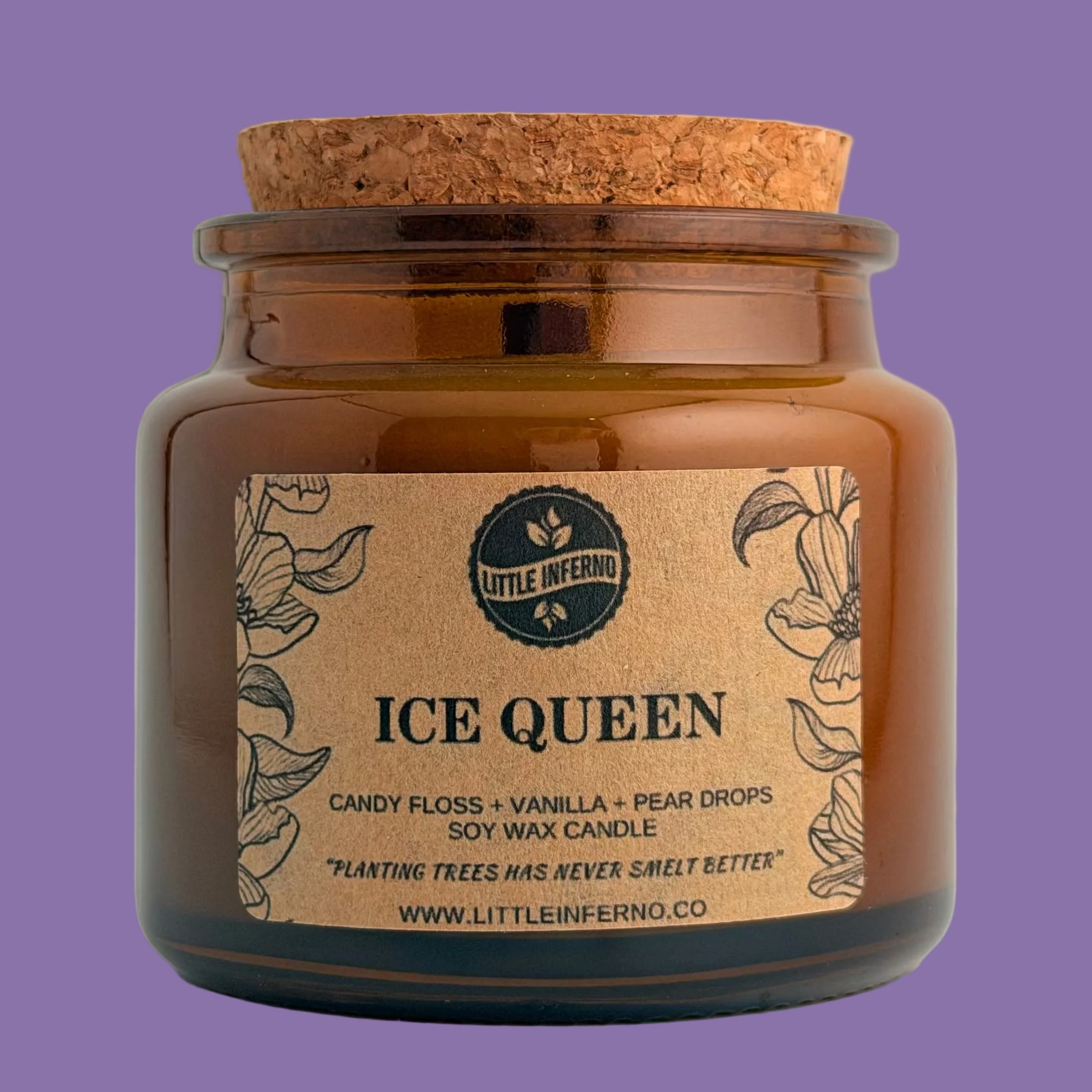 An amber glass jar candle with a cork stopper and a brown paper label reading 'ICE QUEEN' 